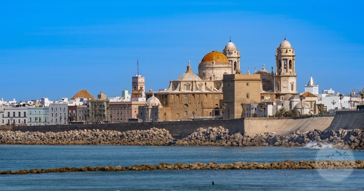 Cadiz Cathedral above the waterfront in Andalusia, Cadiz packing list for women by Roman Trail Outfitters