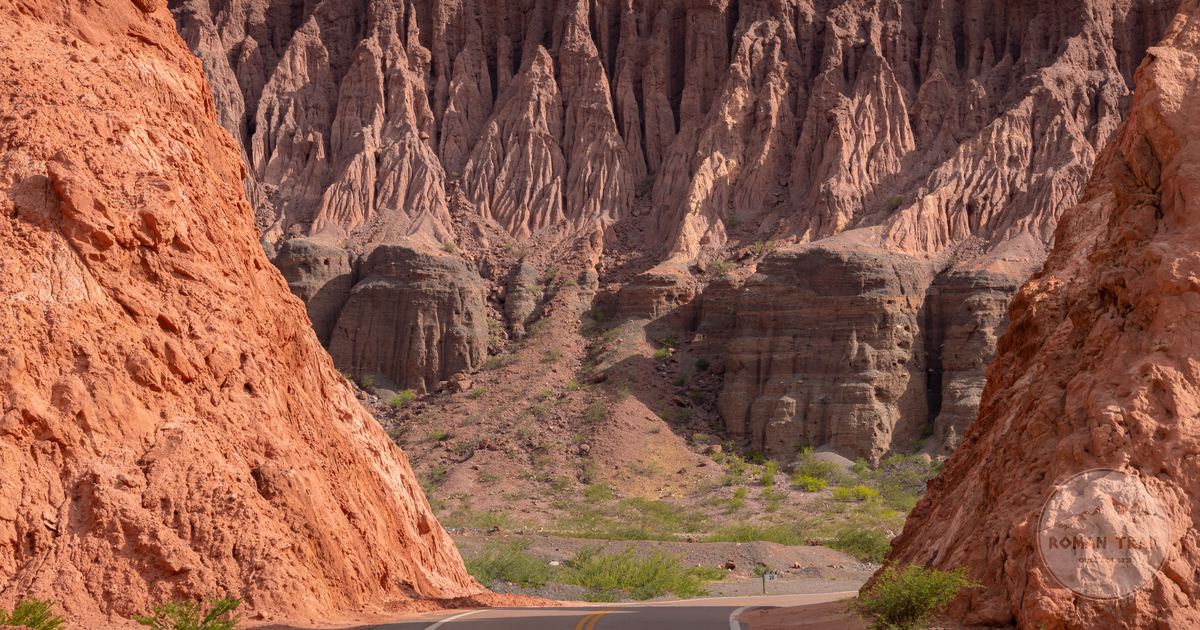 A road winding through rock formations at Cafayate, Salta, Argentina