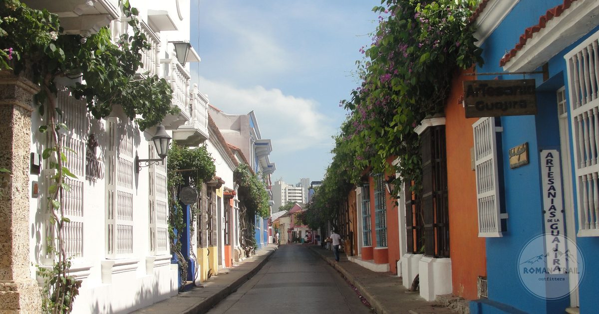 A colonial street with flowering vines in Cartagena, Colombia
