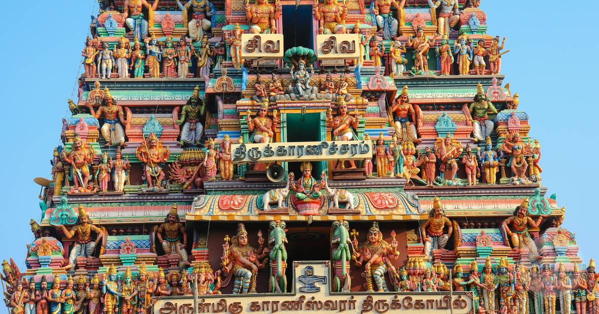 The carved and painted gopuram of a Hindu temple in Chennai, Chennai packing list for women by Roman Trail Outfitters