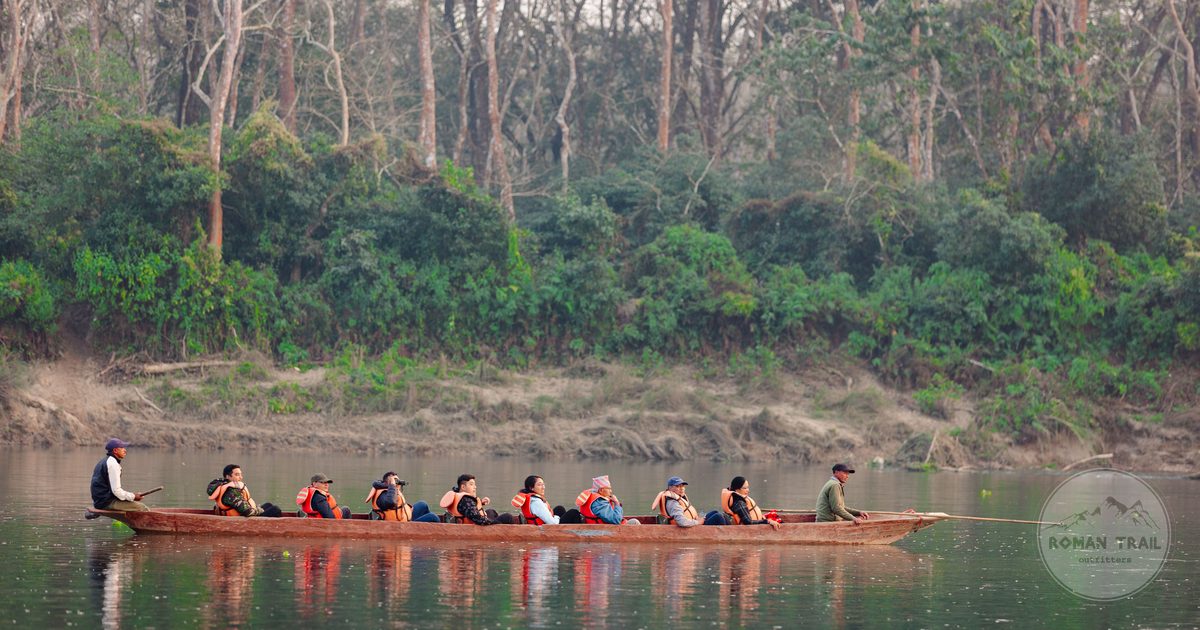 Visitors in a wooden canoe on a calm forest river