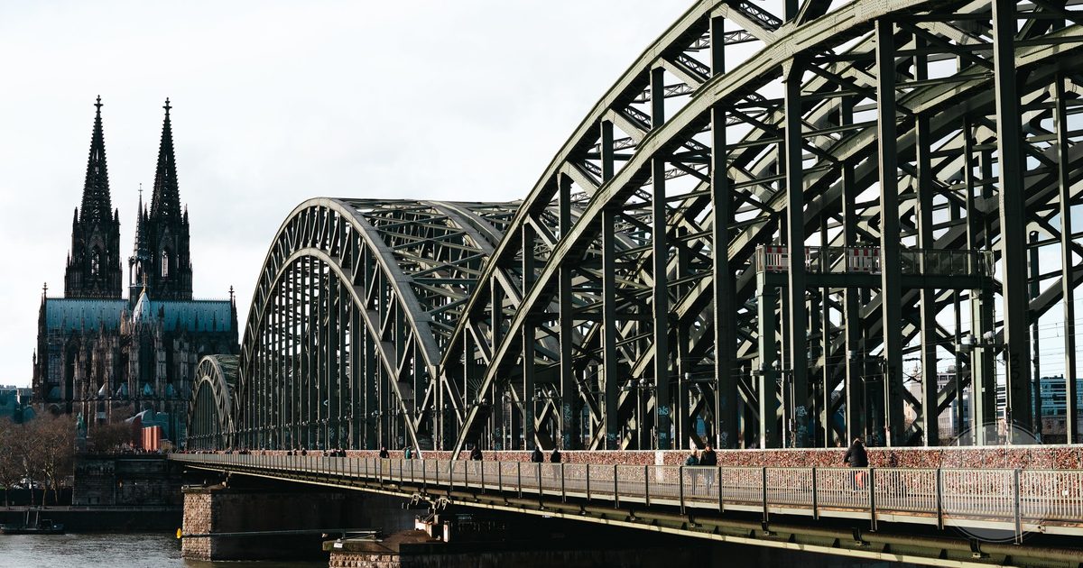The Hohenzollern bridge with Cologne Cathedral behind it, Germany