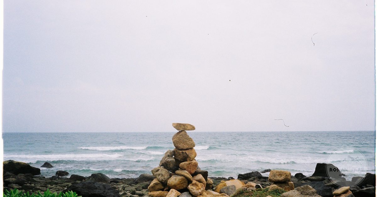 A quiet beach with stacked stones in Ba Ria Vung Tau province, Vietnam