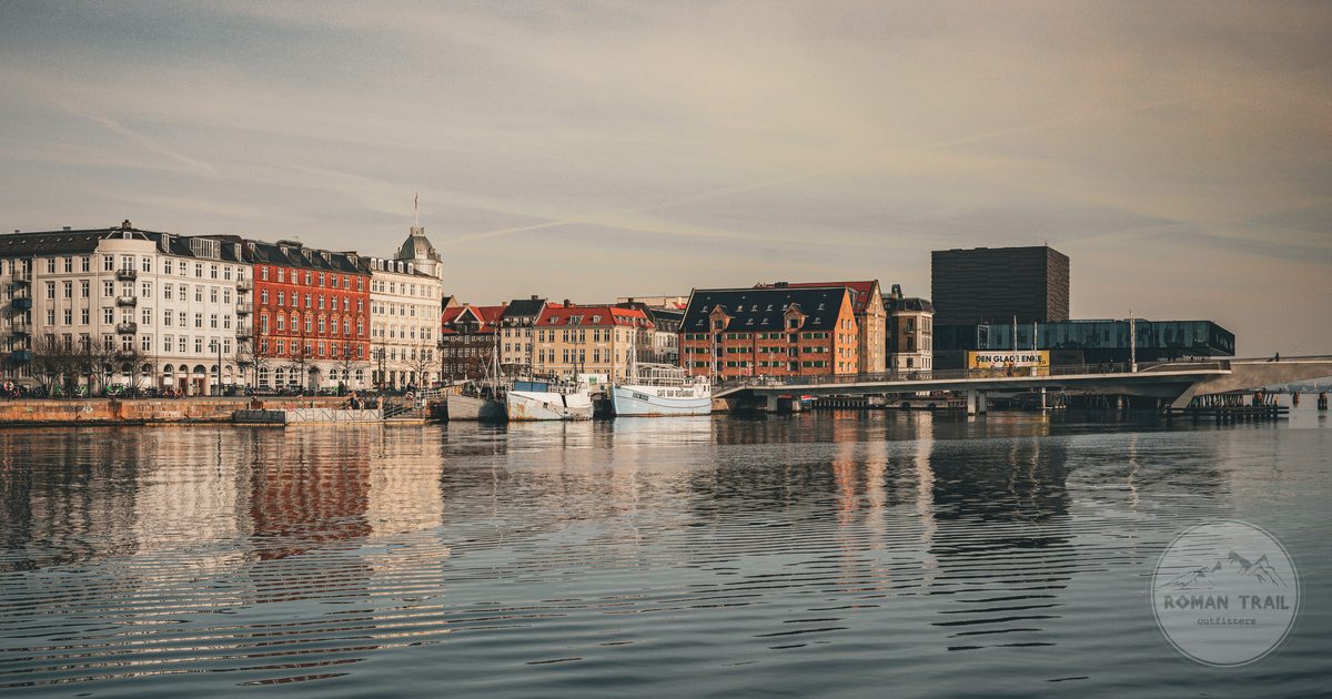 Colourful buildings reflected in the water in Copenhagen, Denmark