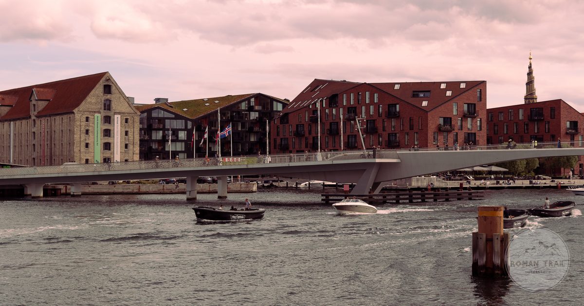 Inderhavnsbroen bridge and the waterfront at dusk in Copenhagen, Denmark