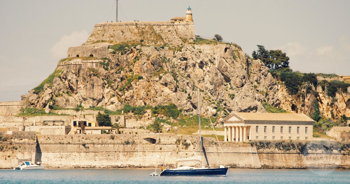 The historic Old Fortress at Corfu seen across the water, Corfu packing list for women by Roman Trail Outfitters