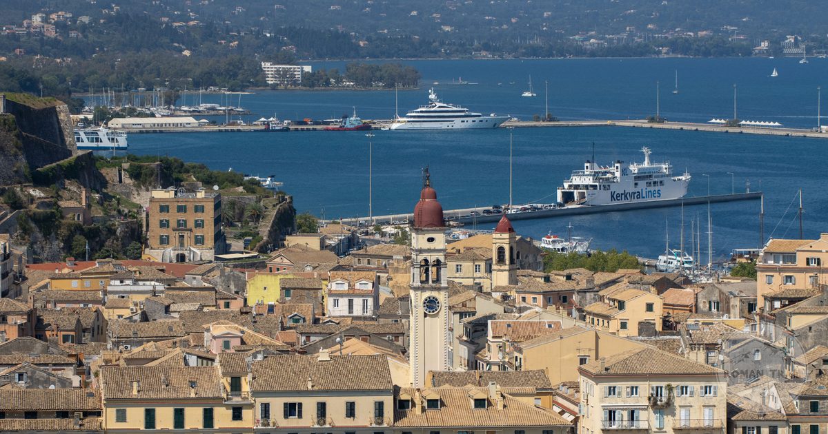 Aerial view of Corfu Town with its harbour and historic architecture, Corfu packing list for women by Roman Trail Outfitters