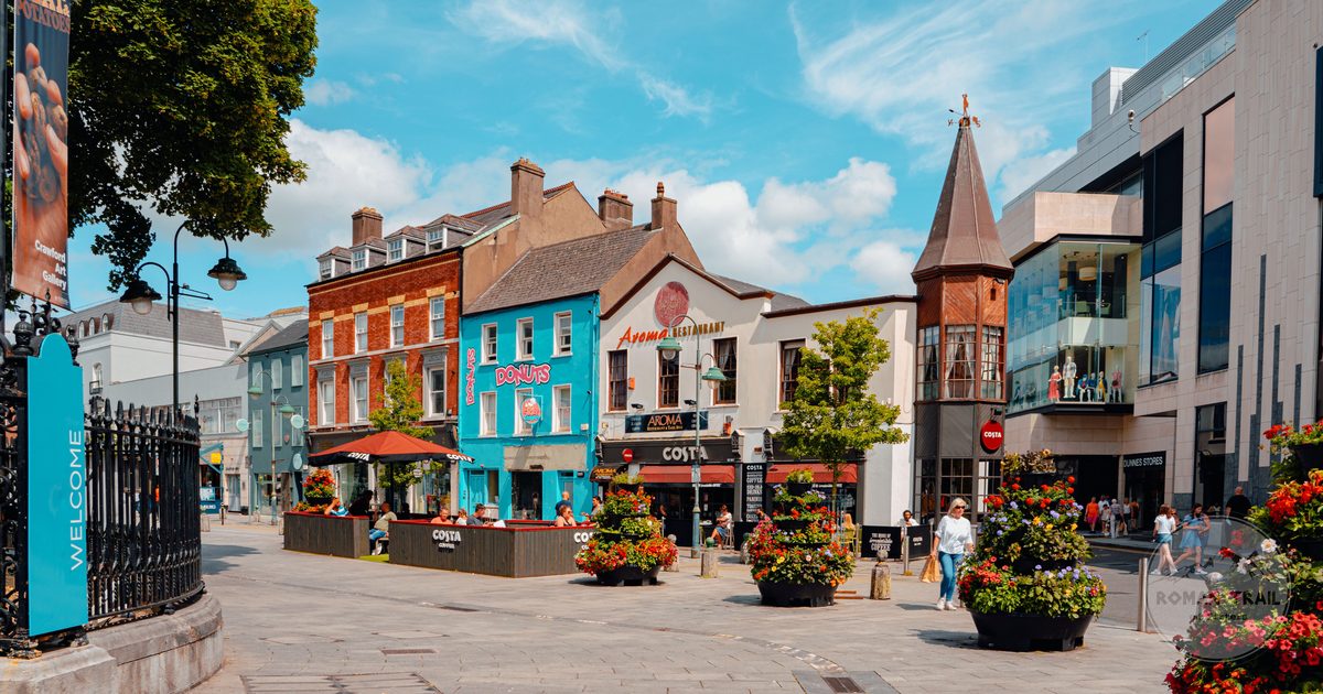 Colourful buildings and a lively street scene in Cork, Ireland