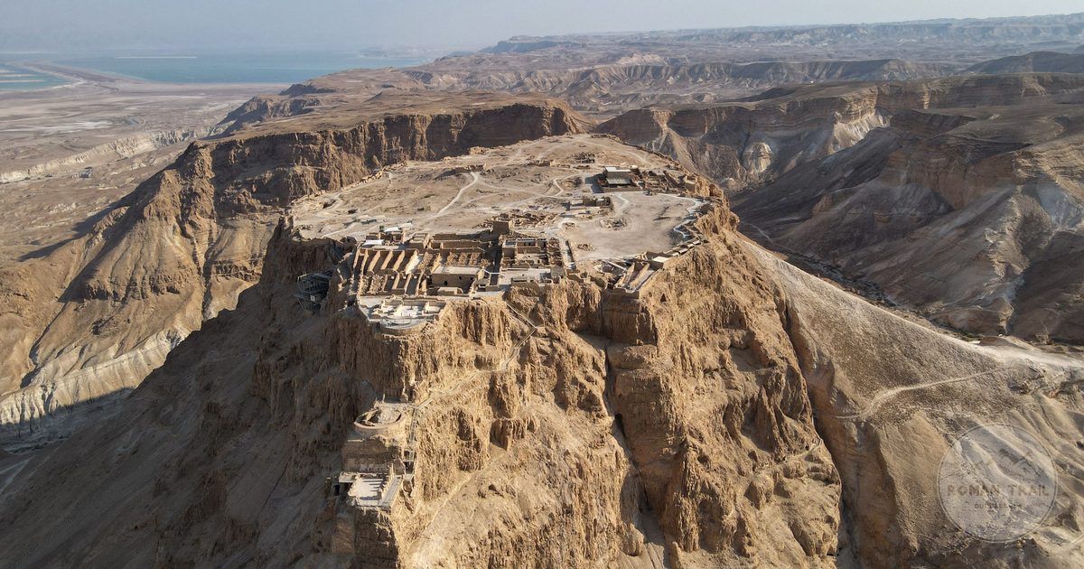The ancient fortress of Masada on its rocky plateau above the Dead Sea valley, Dead Sea packing list for women by Roman Trail Outfitters