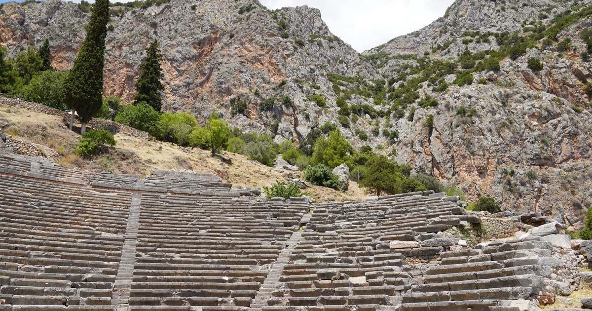 The ancient Greek theatre at Delphi below the slopes of Parnassus, Delphi packing list for women by Roman Trail Outfitters