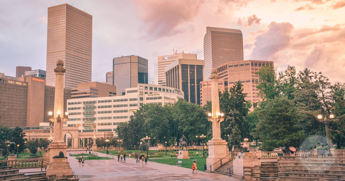 Denver Civic Center park with the downtown skyline at sunset, Denver for women travelers
