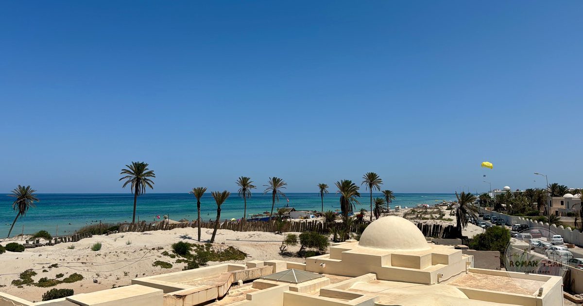A beach under clear skies in Medenine Governorate, southeastern Tunisia