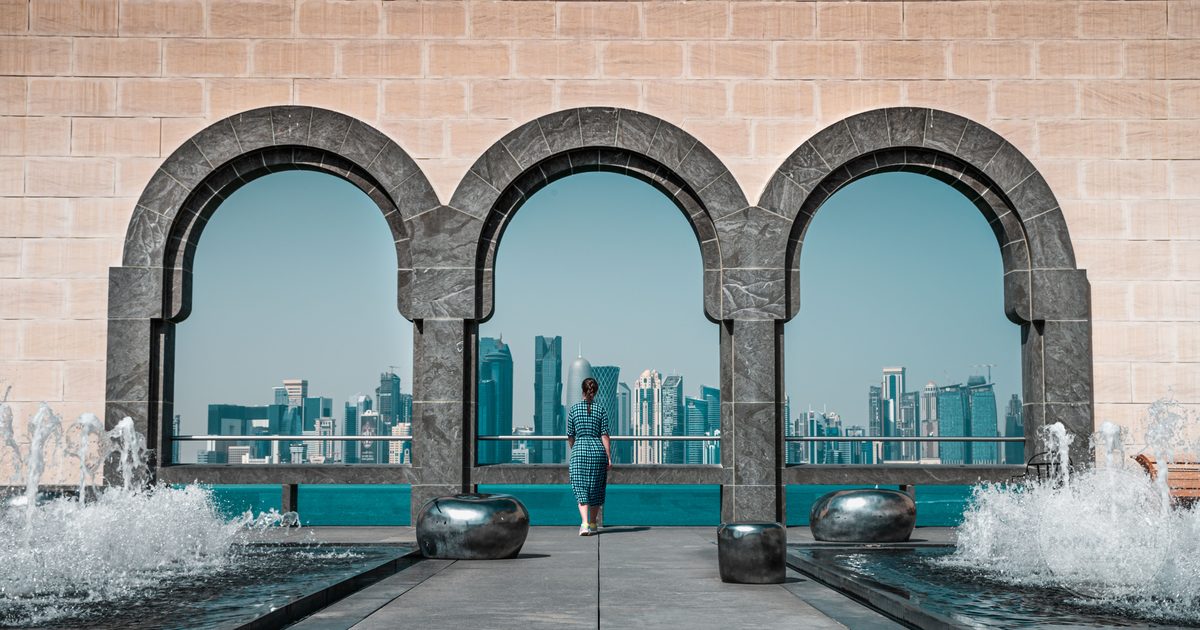 Doha skyline seen through the arches of the Museum of Islamic Art, Qatar