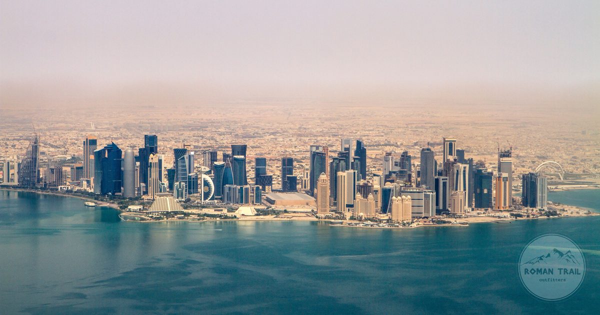 Aerial view of the Doha skyline under a clear sky, Qatar