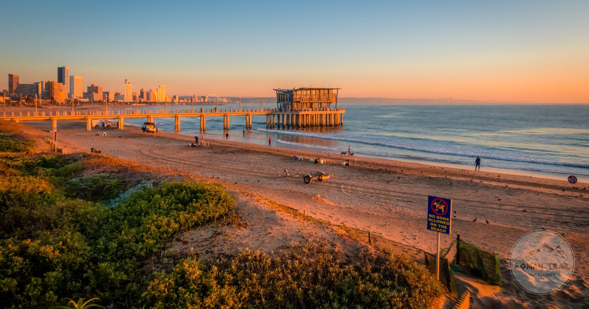Sunrise over the Durban beachfront with the pier reaching into the Indian Ocean, South Africa