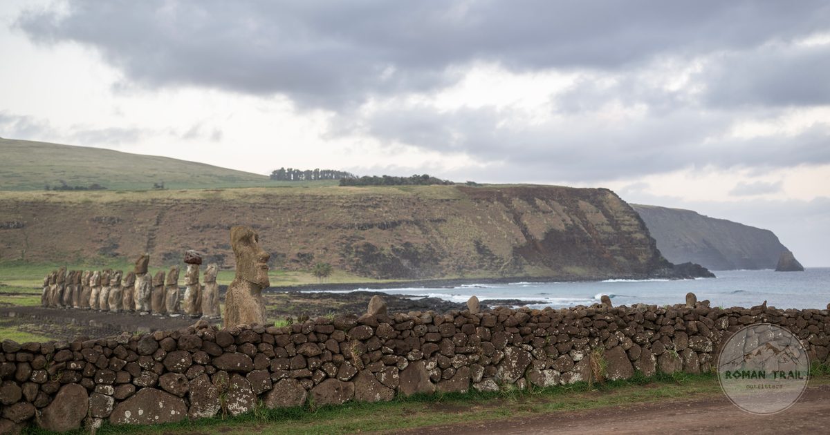Stone moai standing on the coastline of Easter Island, Chile