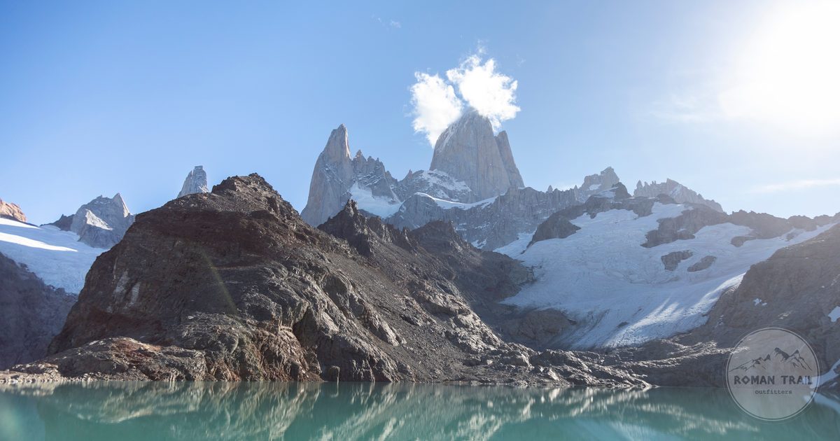 The snowcapped Fitz Roy range above a lake in Patagonia, Argentina