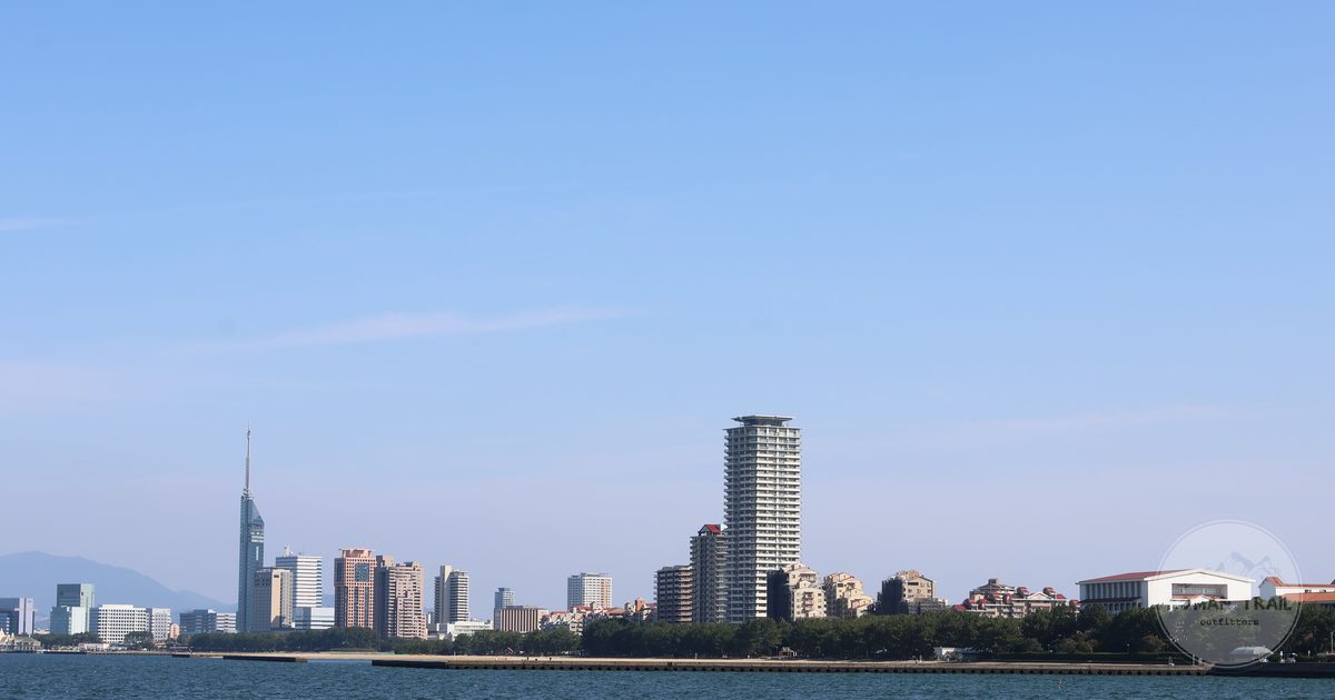 The Fukuoka city skyline and waterfront under clear sky, Japan