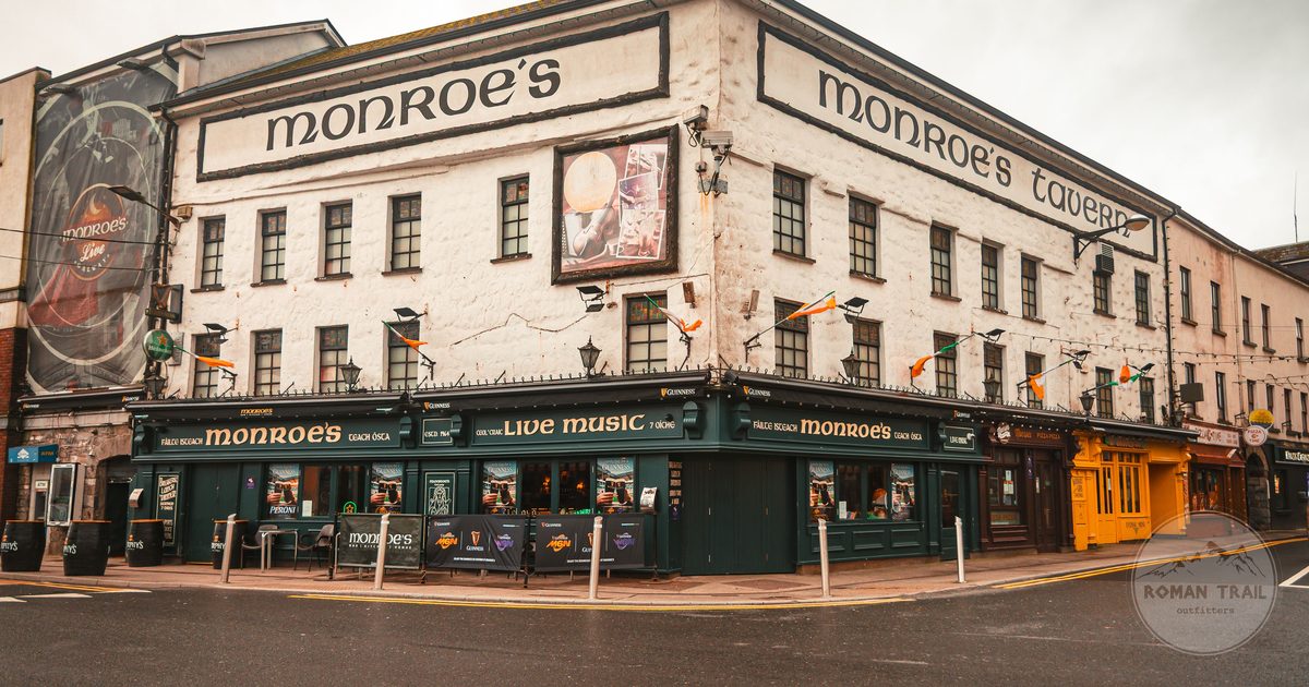The painted front of Monroe's Tavern on a street in Galway, Ireland