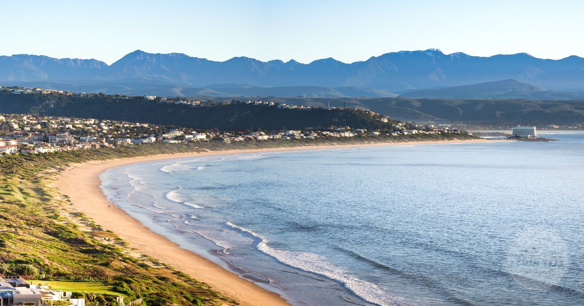 Aerial view of the Plettenberg Bay coastline and mountains on the Garden Route, South Africa