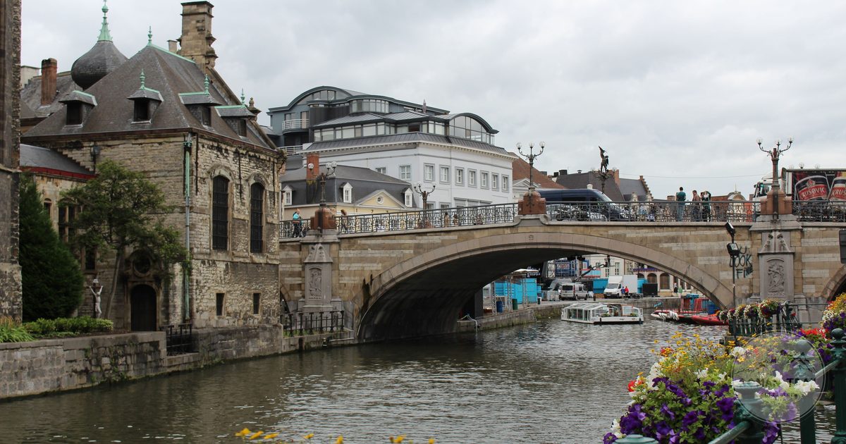 A canal, bridge and flowers in the centre of Ghent, Belgium