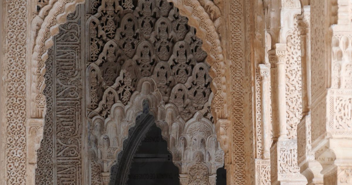 Moorish architectural detail inside the Alhambra, Granada, Spain