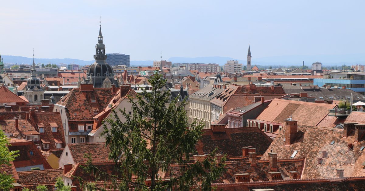 Aerial view of the red tiled rooftops and towers of Graz, Styria, Austria