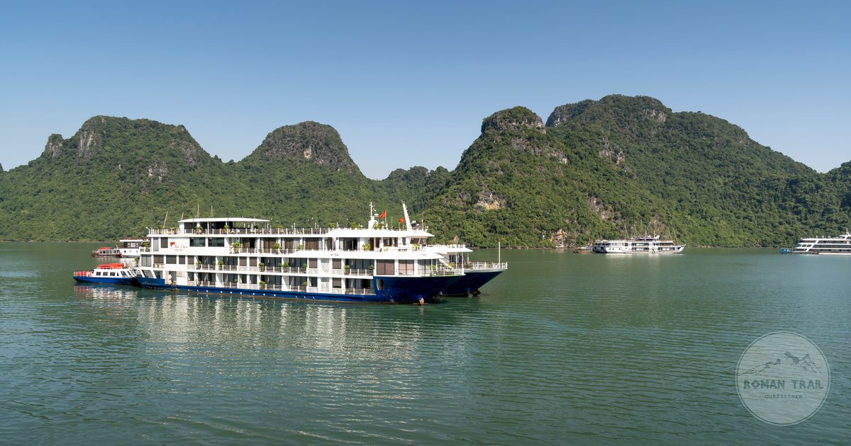 Cruise boats on the emerald water of Ha Long Bay, Vietnam