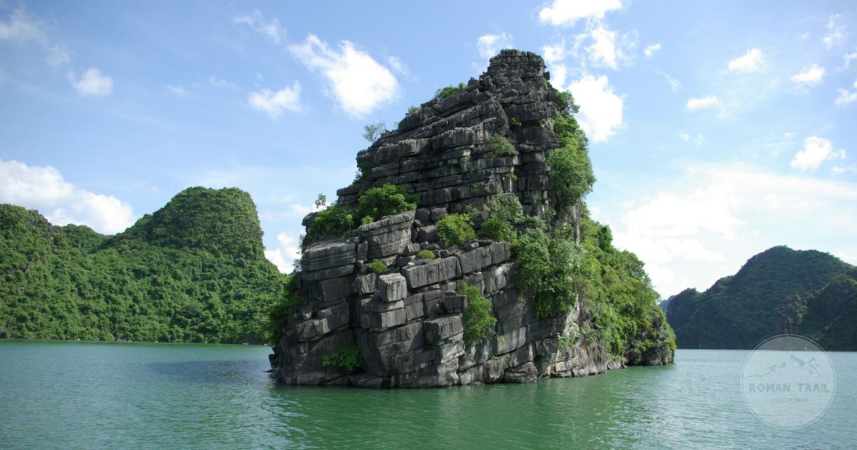 Rock formations and greenery in Ha Long Bay, Vietnam