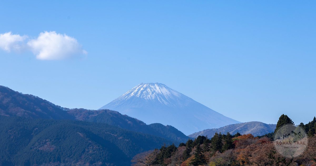 Autumn foliage below Mount Fuji under a clear sky, Hakone packing list for women by Roman Trail Outfitters