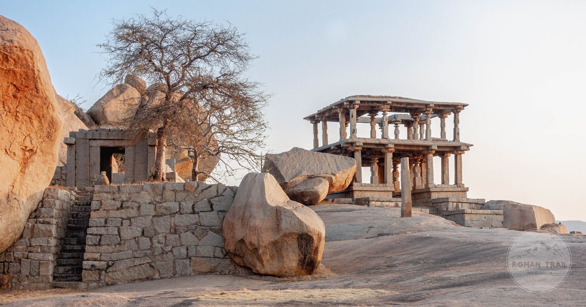 Granite boulders and stone structures at sunrise in Hampi, Karnataka, Hampi packing list for women by Roman Trail Outfitters