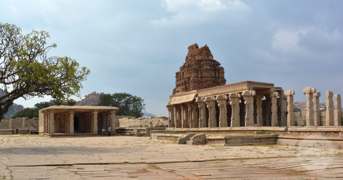 Carved stone architecture of the Vittala temple complex at Hampi, Hampi packing list for women by Roman Trail Outfitters