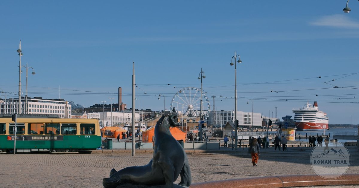 A tram and the ferris wheel on the Helsinki waterfront, Finland