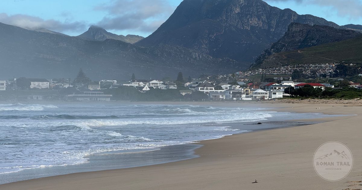 A misty morning on the shore at Hermanus with mountains behind, South Africa