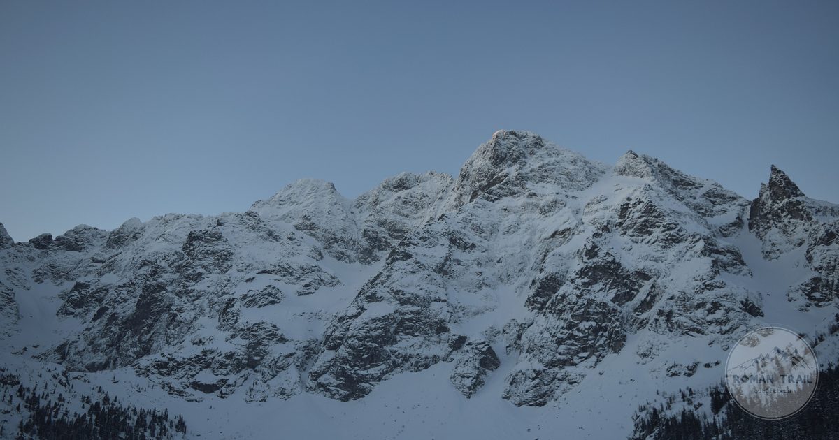 Snow-covered mountains under clear sky in the Tatras