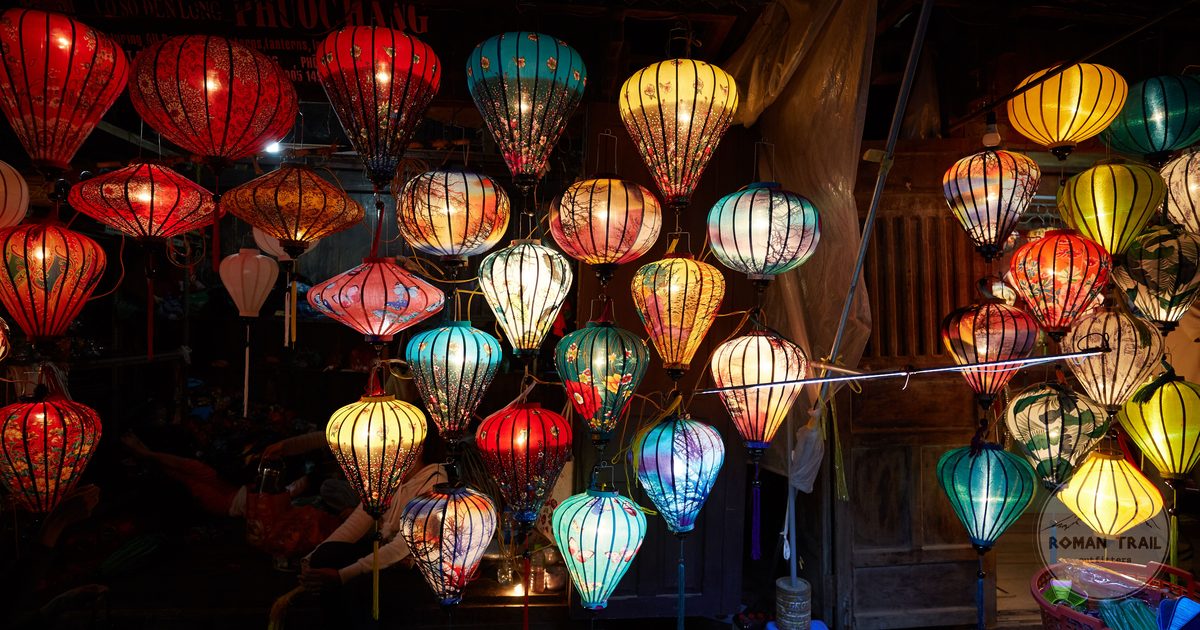 Rows of coloured silk lanterns glowing at the Hoi An night market, Hoi An for women travelers