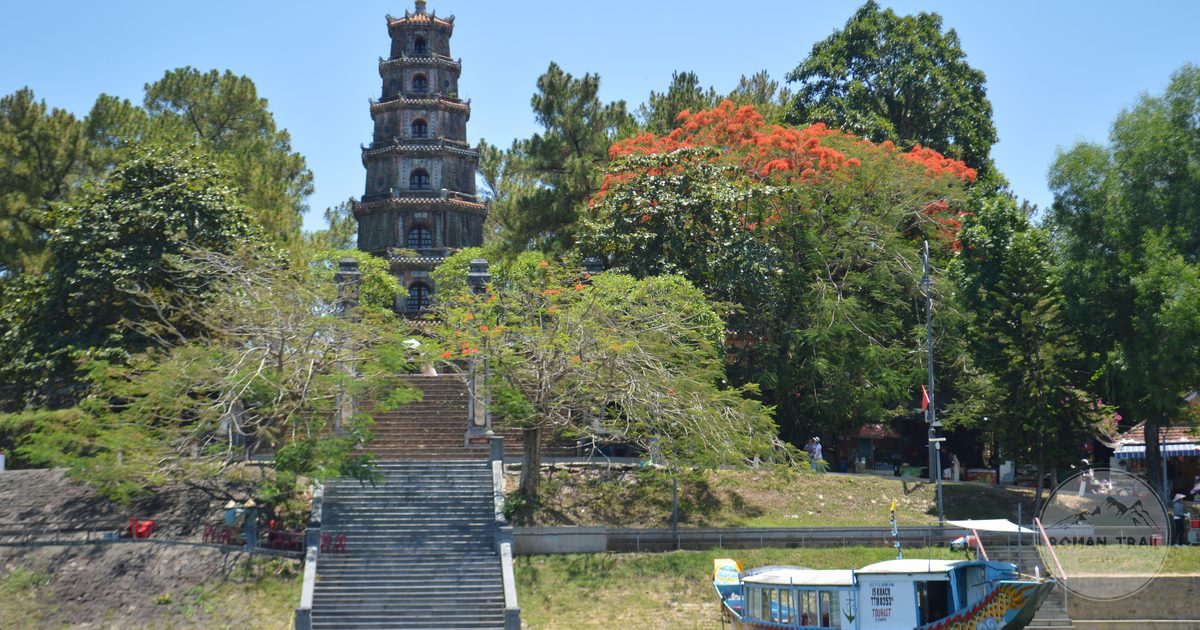 Thien Mu Pagoda and a boat on the Perfume River at Hue, Vietnam