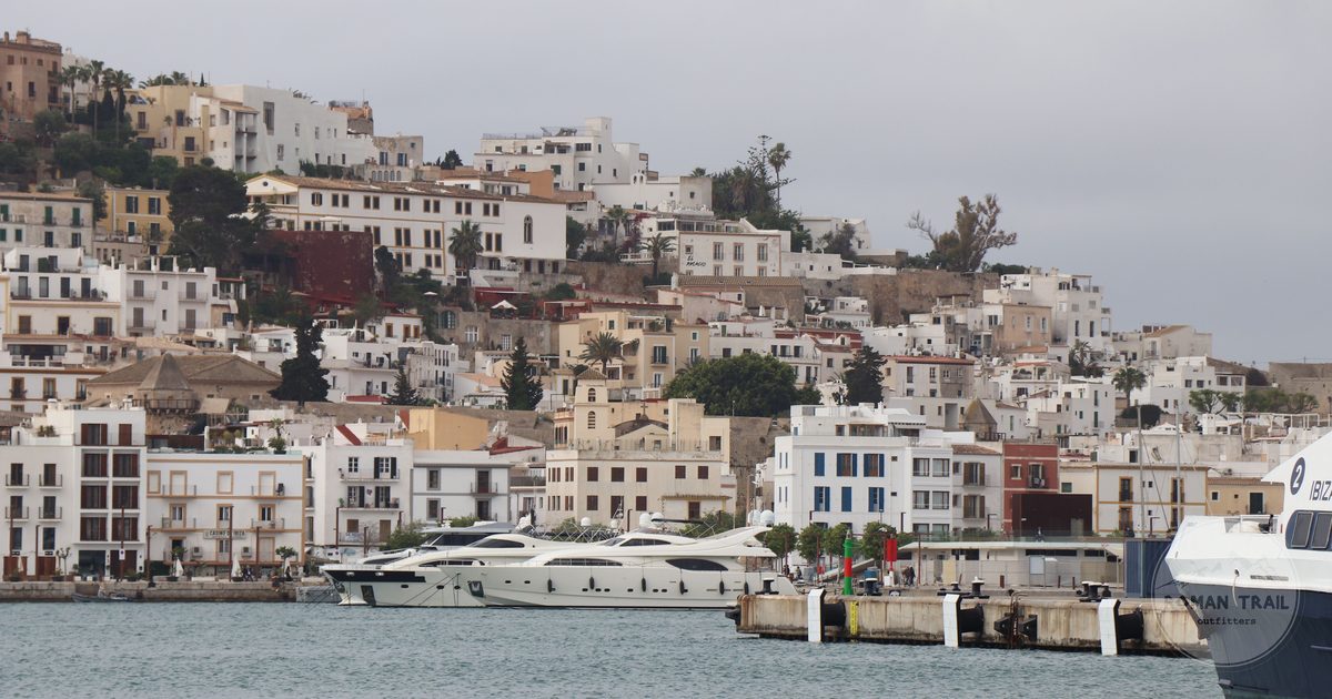 The old town architecture and marina of Ibiza, Ibiza packing list for women by Roman Trail Outfitters