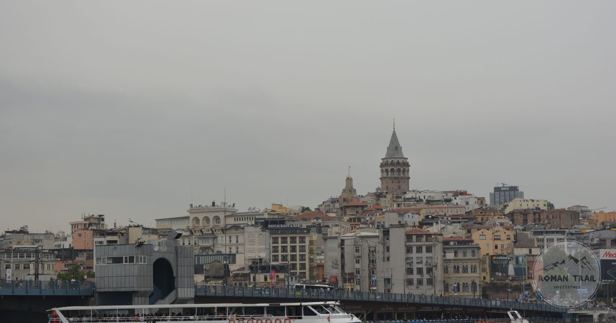 A ferry crossing the Bosphorus near the Galata Tower, Istanbul, Turkiye