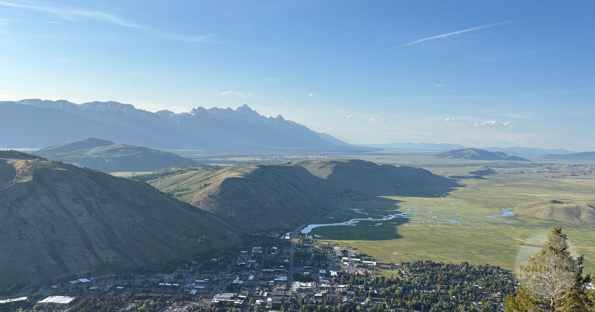 An aerial view of Jackson Hole with the Teton Range behind it, Wyoming