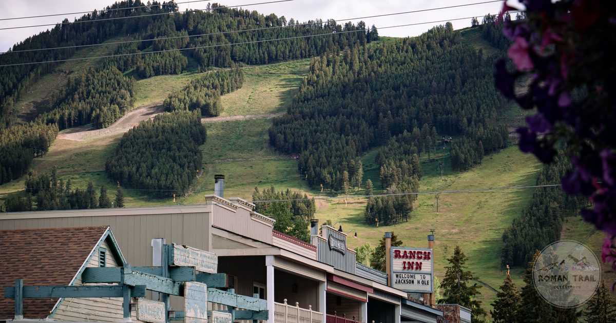 A street in the town of Jackson with mountains behind it, Wyoming