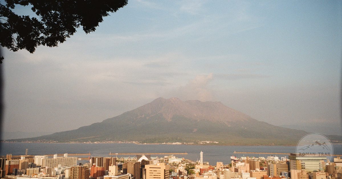 The Kagoshima cityscape with Sakurajima volcano behind, Japan
