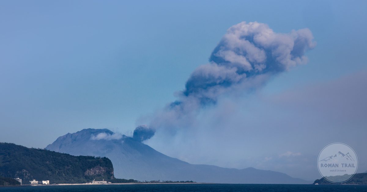 Sakurajima volcano erupting with a plume of smoke above Kagoshima, Japan