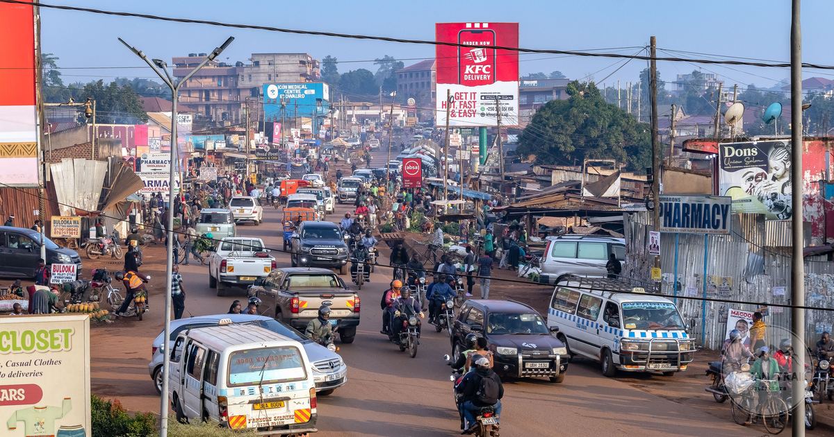 A busy street with daily life and local transport in Kampala, Uganda
