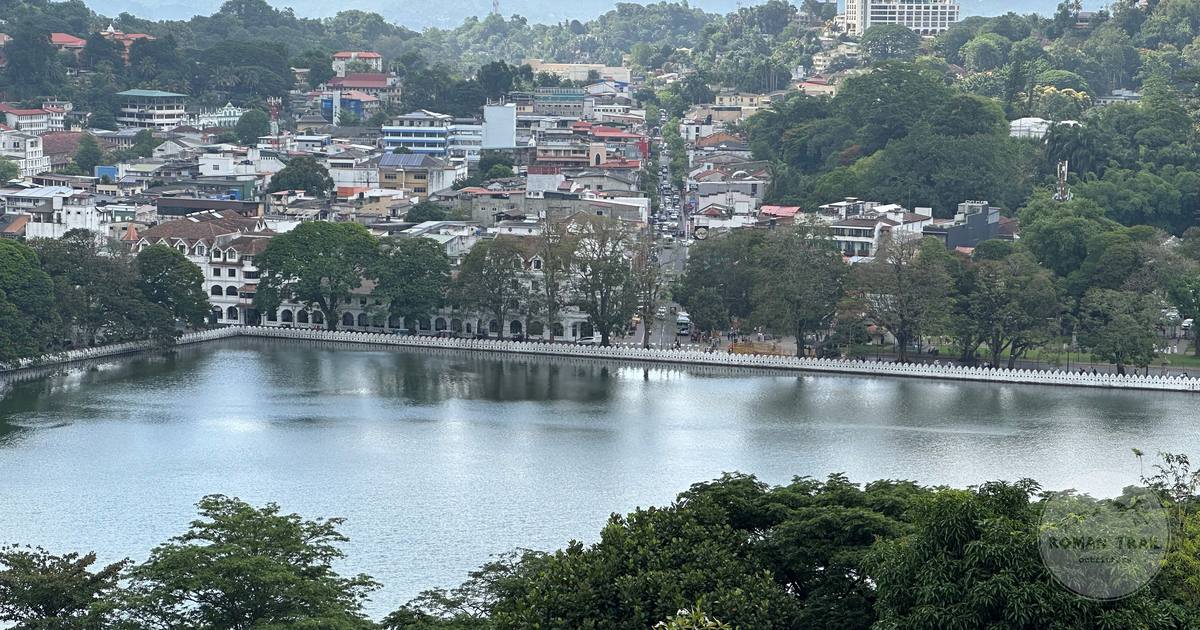 Aerial view of Kandy and its lake surrounded by forested hills, Sri Lanka