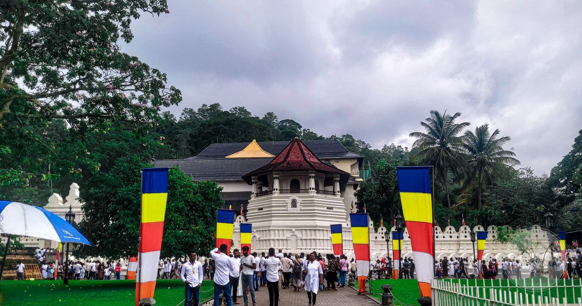 A cultural procession outside the Temple of the Tooth in Kandy, Sri Lanka
