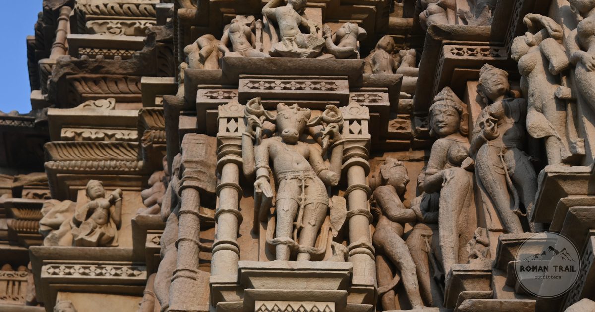 Detailed stone carvings on a Khajuraho temple, India