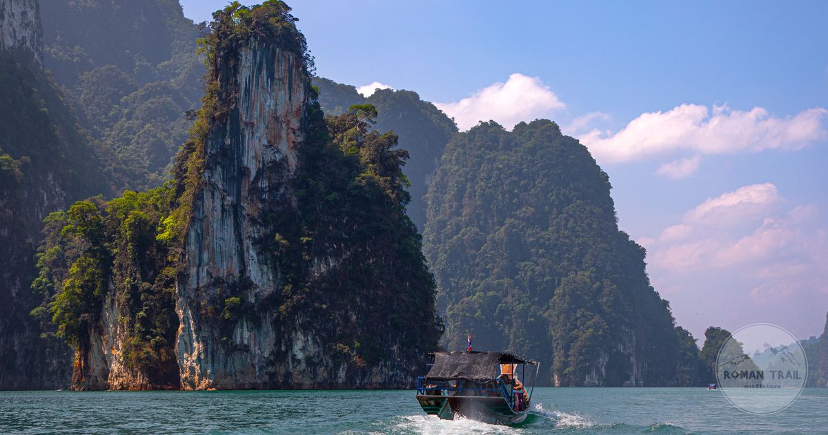 A longtail boat on Cheow Lan Lake in Khao Sok National Park, Thailand