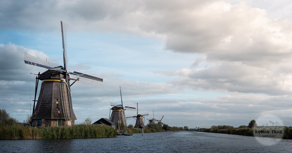 Traditional Dutch windmills along a canal at Kinderdijk, Netherlands