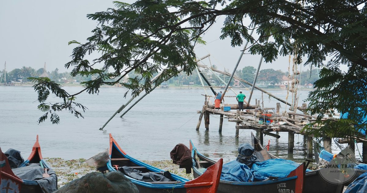 Fishing boats beside the Chinese nets on the backwaters at Kochi, India